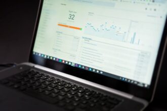 everysize - A laptop displaying an analytics dashboard with real-time data tracking and analysis too